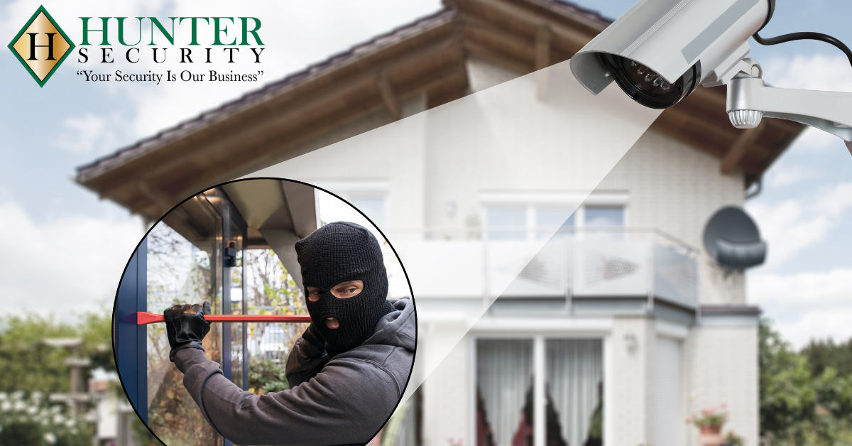 utdoor security camera catching a burglar attempting a home break-in